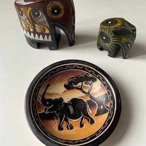 African Ethnic handcrafted elephant statues with matching small bowl.